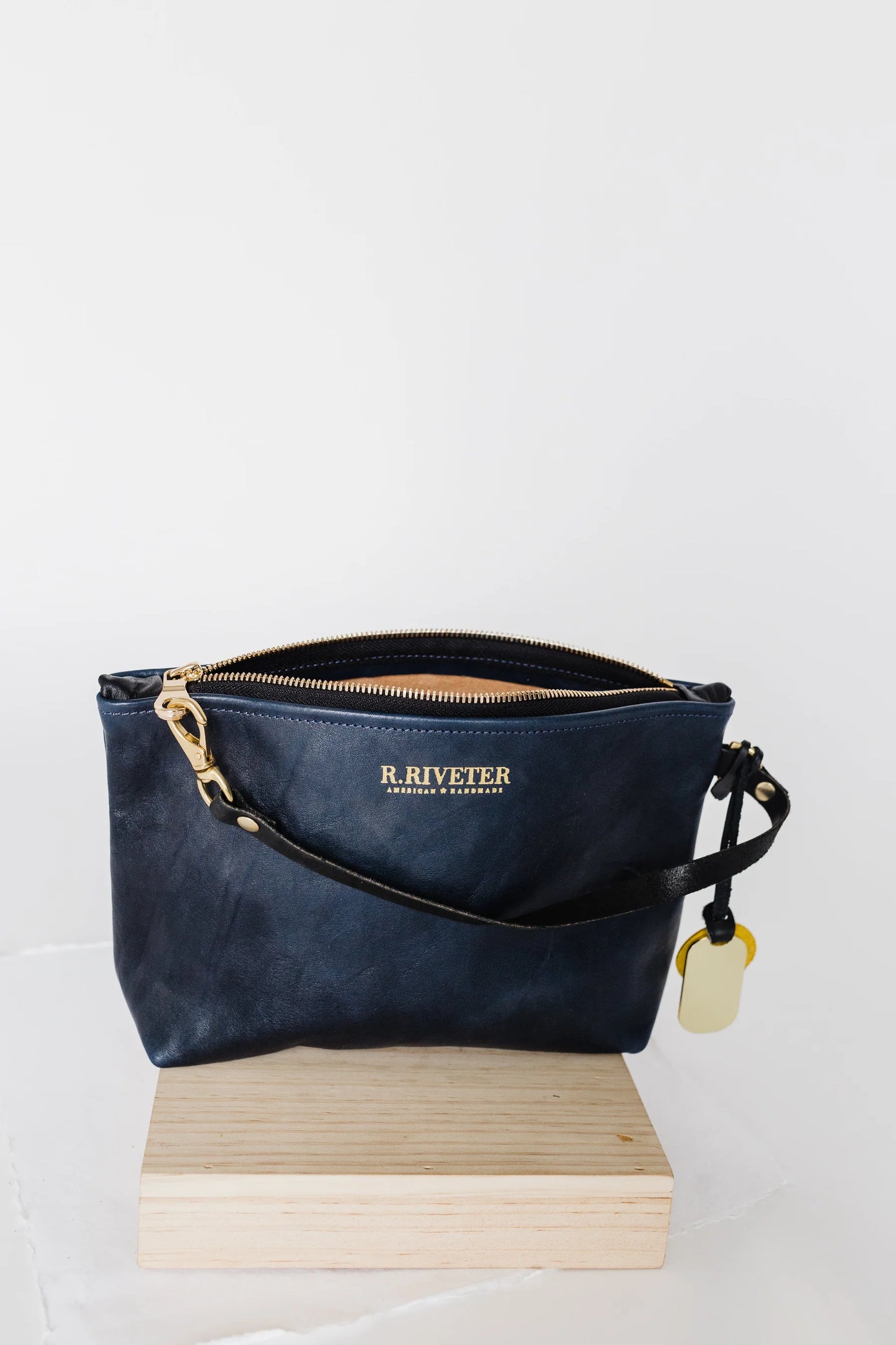 R.Riveter Naomi Signature Leather Clutch- Navy